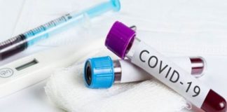 Coronavirus, farmaci e vaccini, a che punto siamo. Provetta con nome Covid-19