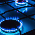 Burning,Blue,Gas,Focus,On,The,Front,Edge,Of,The